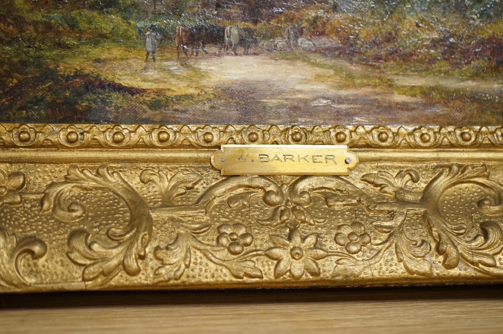 W. Barker, oil on canvas, Village scene with cattle, signed and dated 1865, ornate gilt framed, 15 x 28cm